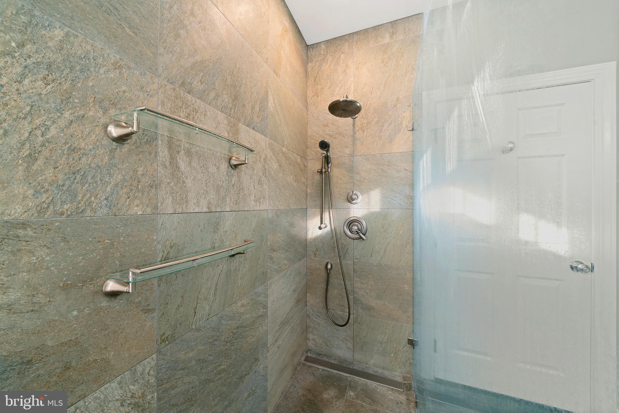 18700 Olney Mill Road Olney, MD 20832 - Photo 52 of 86 a bathroom with a shower