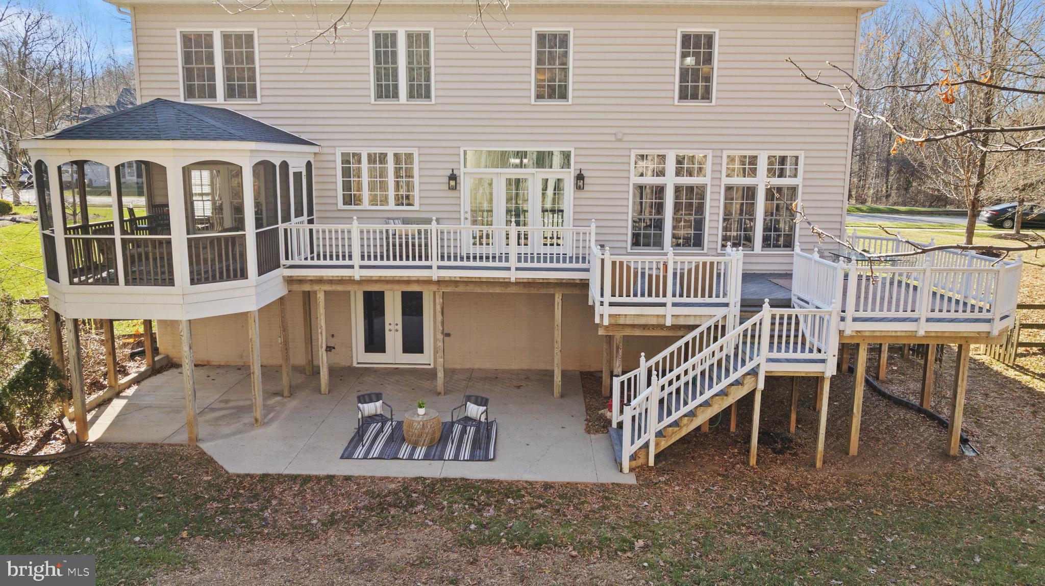 18700 Olney Mill Road Olney, MD 20832 - Photo 10 of 86 a front view of a house with a yard outdoor seating and barbeque oven