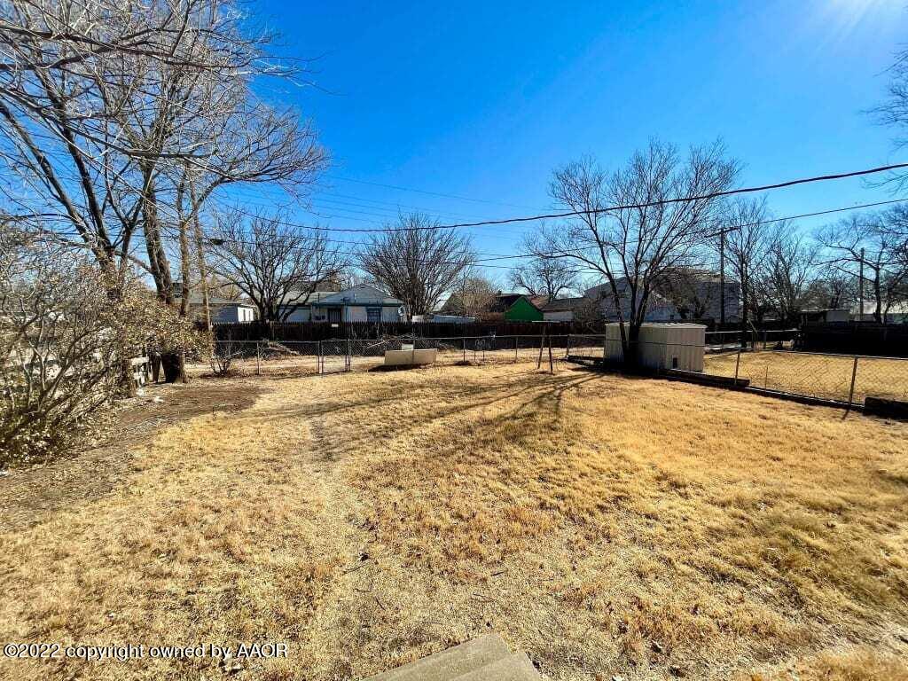 4319 Gables Street Amarillo, TX 79110 - Photo 15 of 15 a view of yard covered with snow in the background
