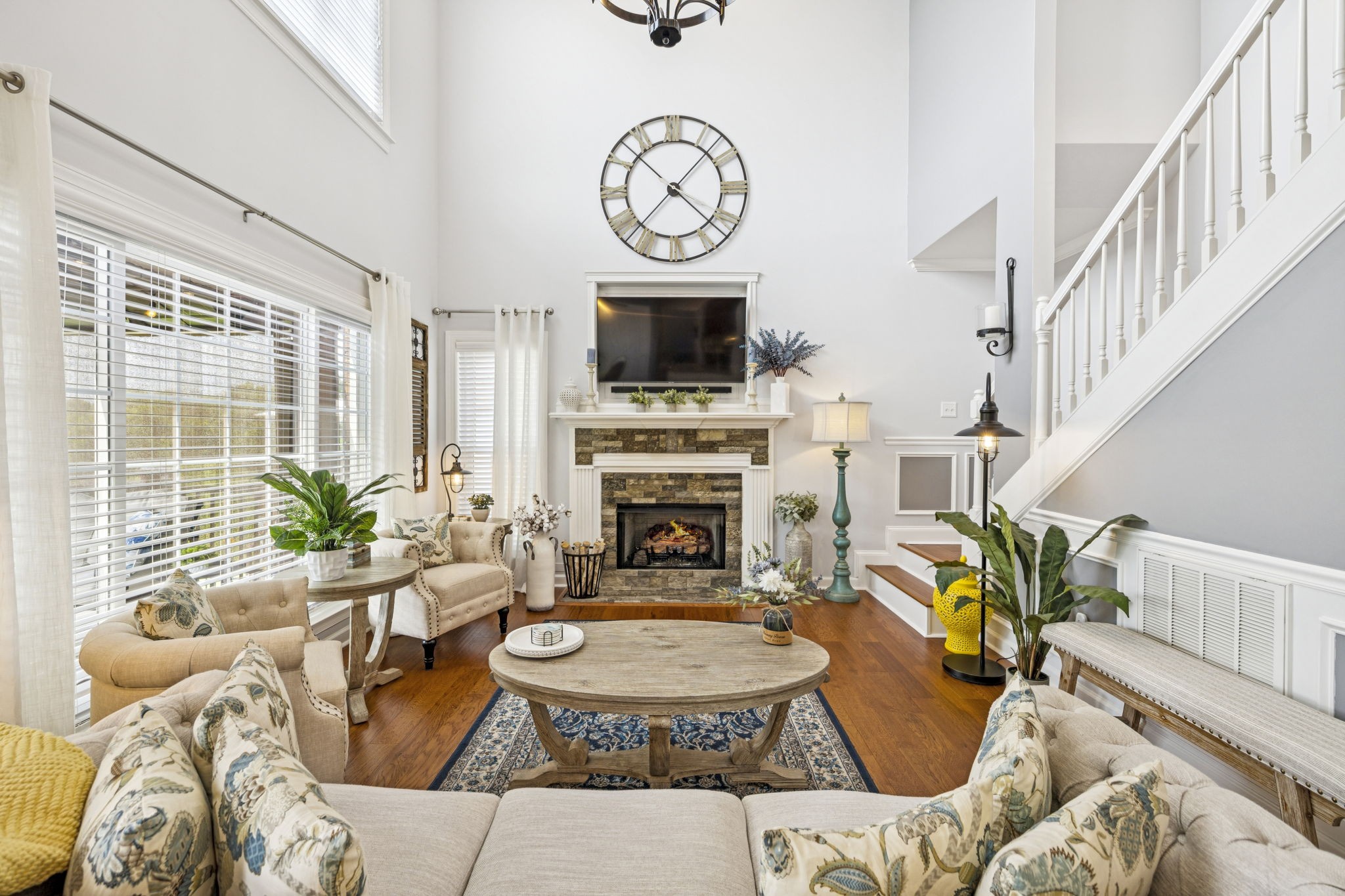 1011 Red Pepper Ridge Spring Hill, TN 37174 - Photo 16 of 76 a living room with furniture a fireplace and a large window