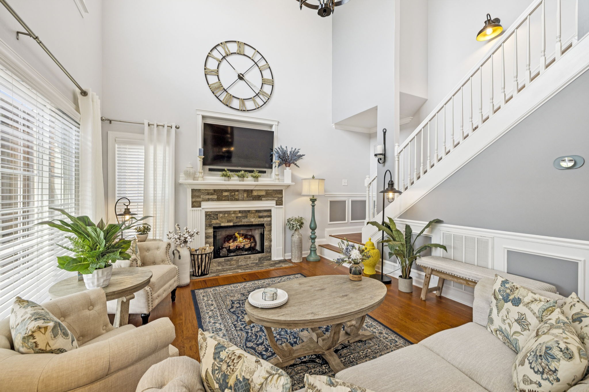 1011 Red Pepper Ridge Spring Hill, TN 37174 - Photo 17 of 76 a living room with furniture a fireplace and a large window
