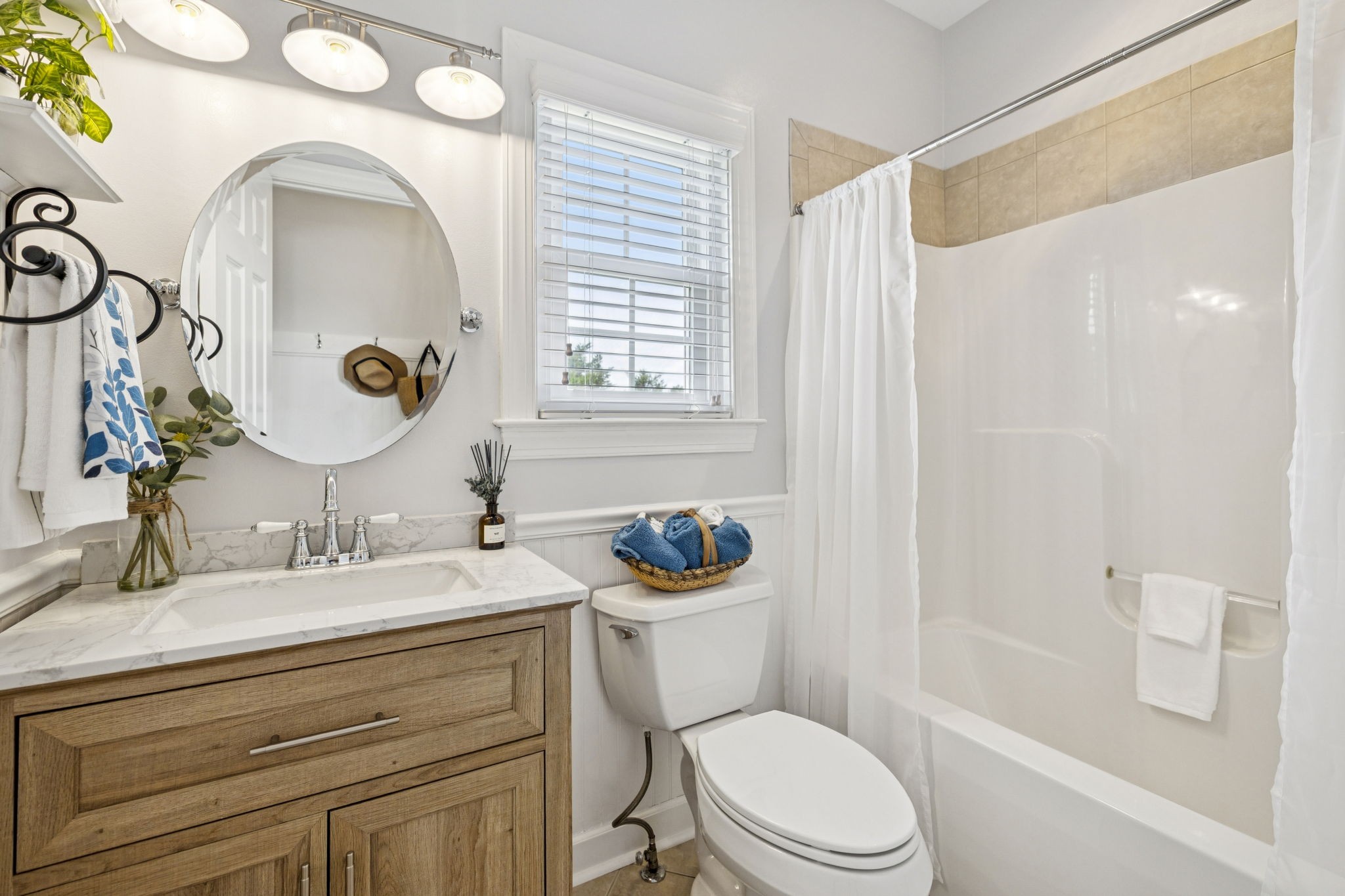 1011 Red Pepper Ridge Spring Hill, TN 37174 - Photo 36 of 76 a bathroom with a granite countertop toilet sink and mirror