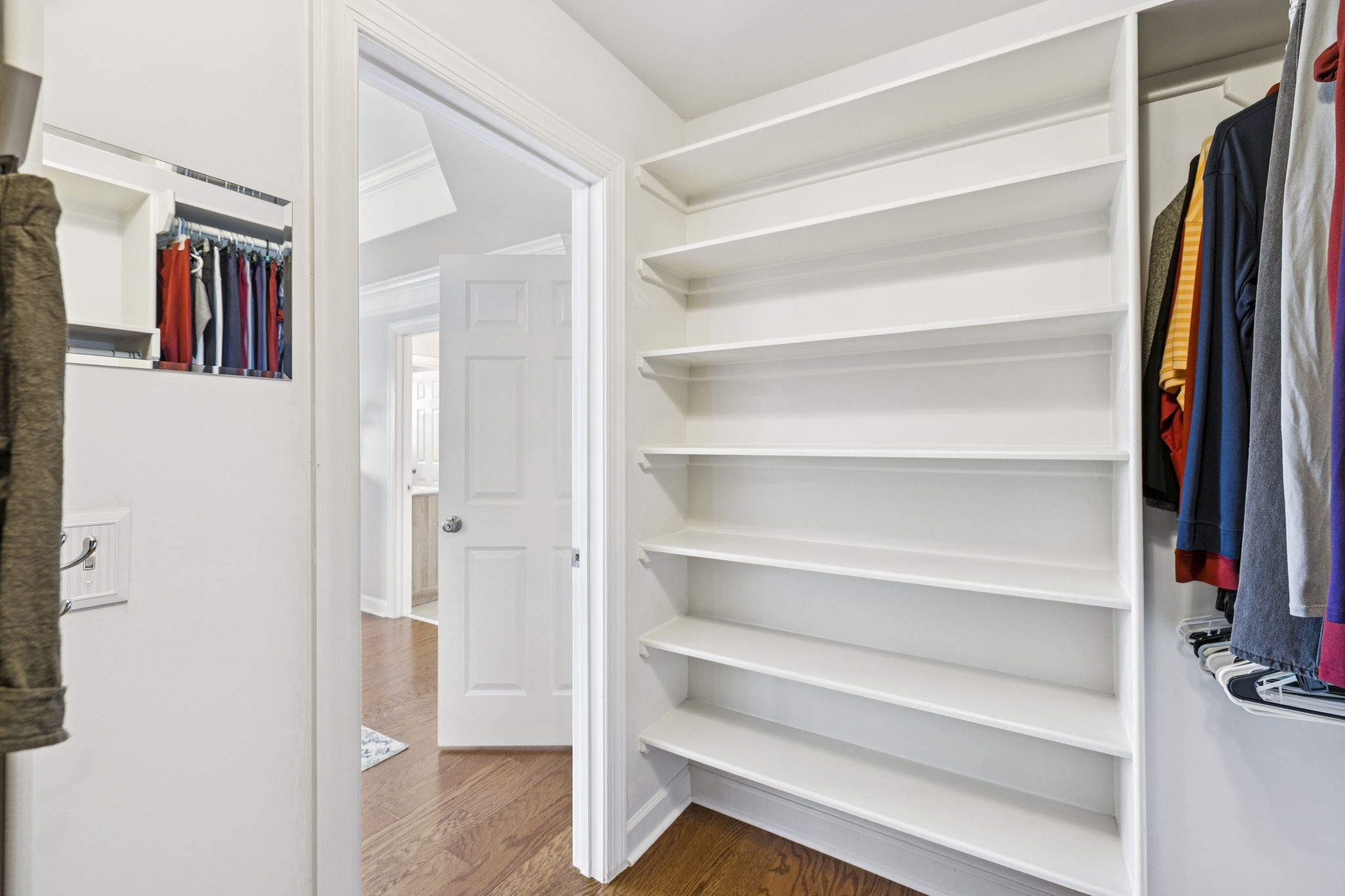 1011 Red Pepper Ridge Spring Hill, TN 37174 - Photo 53 of 76 a view of walk in closet with clothes and shoes