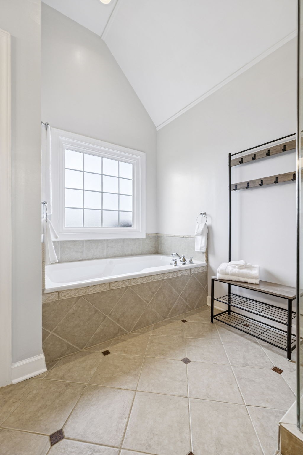 1011 Red Pepper Ridge Spring Hill, TN 37174 - Photo 56 of 76 a spacious bathroom with a bathtub and next to a window