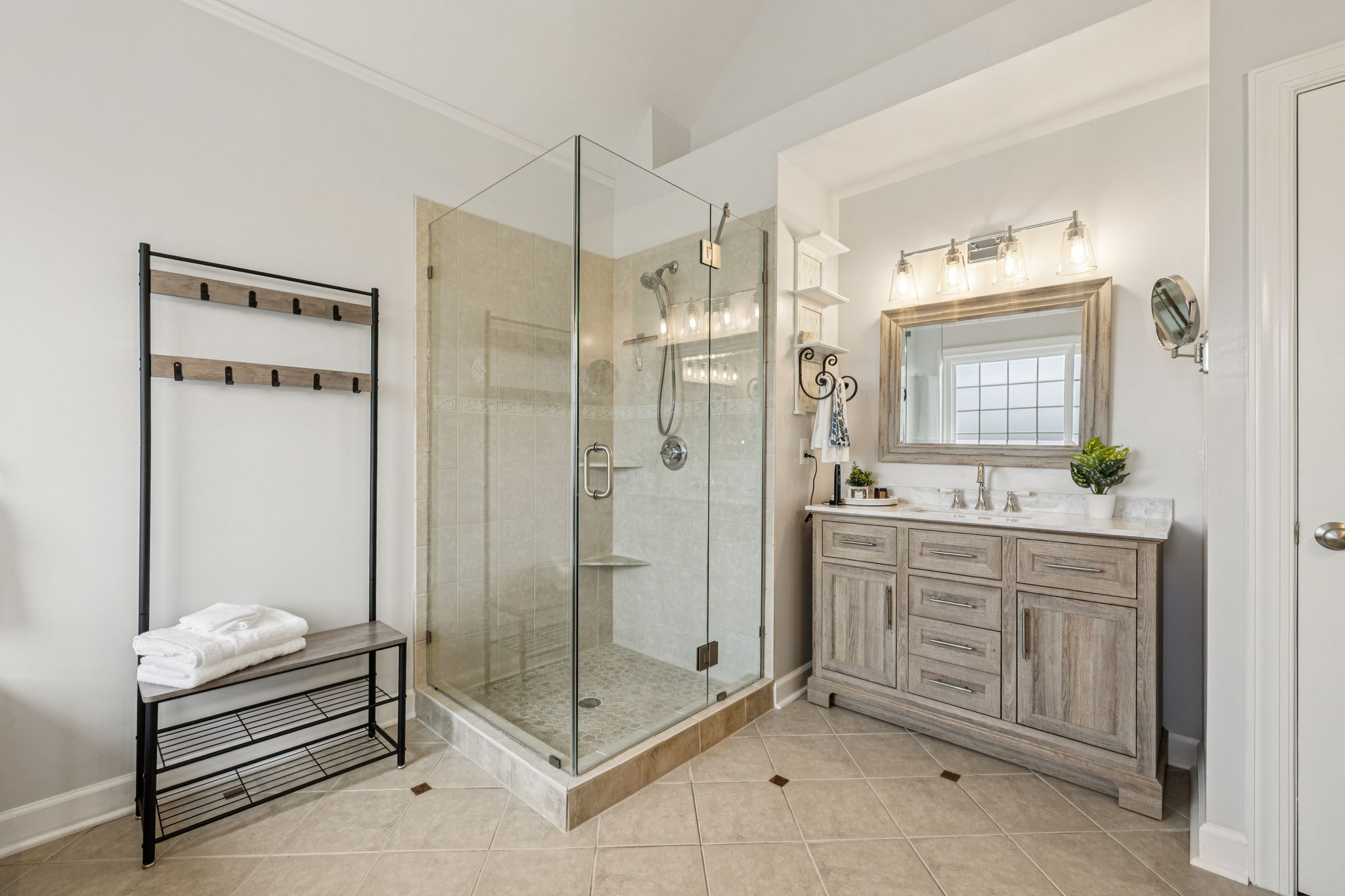 1011 Red Pepper Ridge Spring Hill, TN 37174 - Photo 60 of 76 a bathroom with a shower sink and mirror