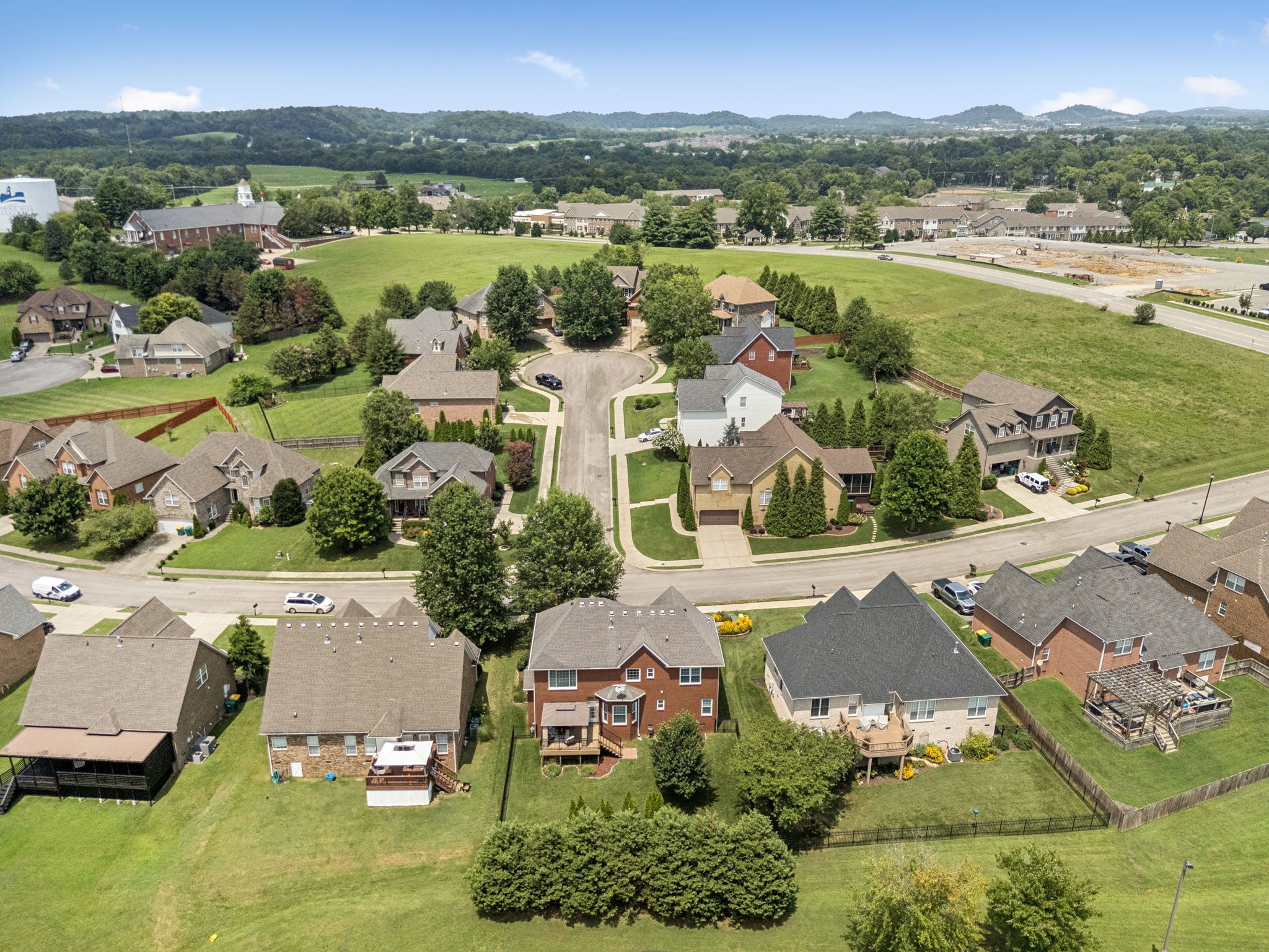 1011 Red Pepper Ridge Spring Hill, TN 37174 - Photo 70 of 76 an aerial view of residential houses with outdoor space and river