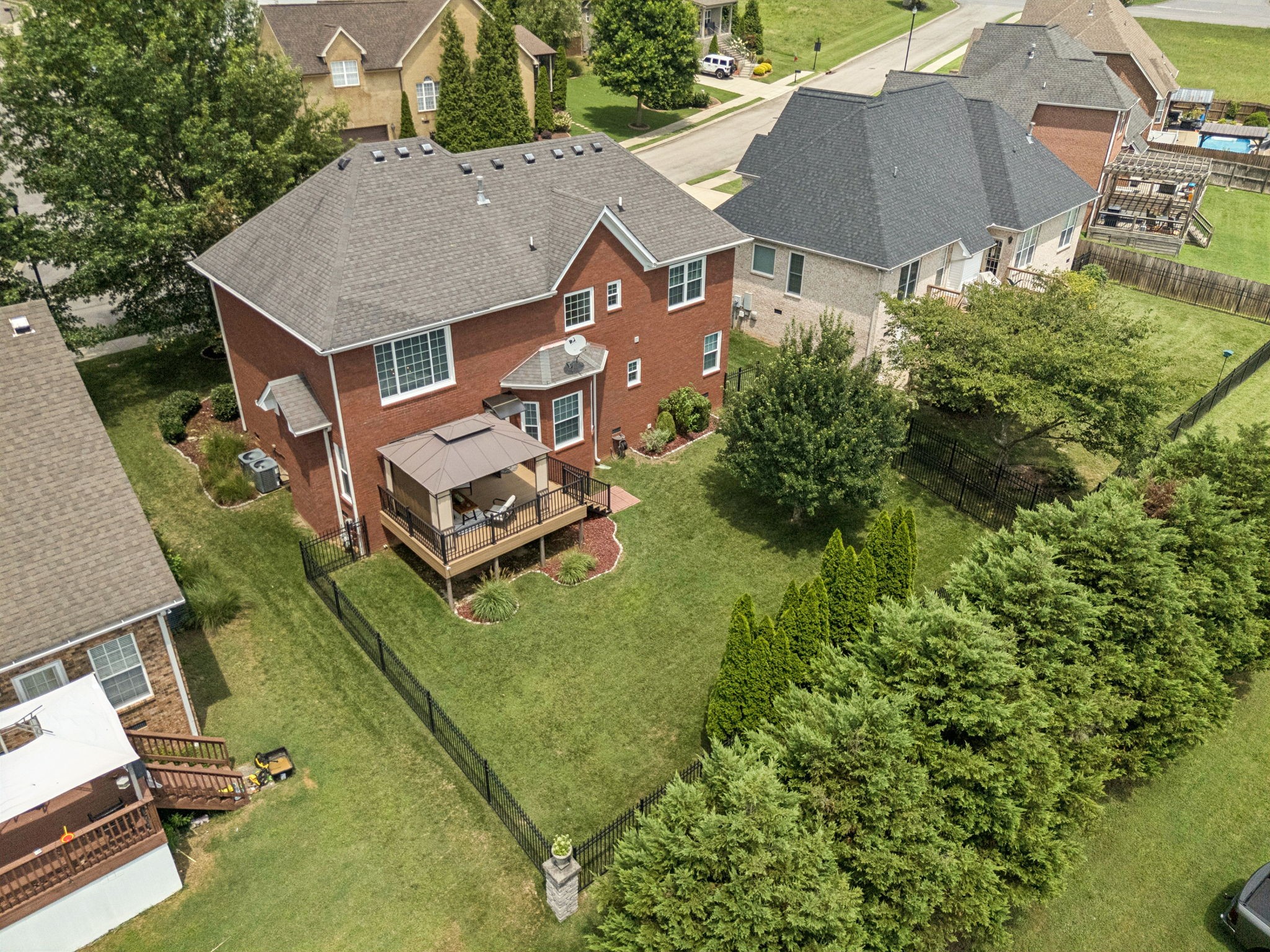 1011 Red Pepper Ridge Spring Hill, TN 37174 - Photo 72 of 76 an aerial view of a house with a garden