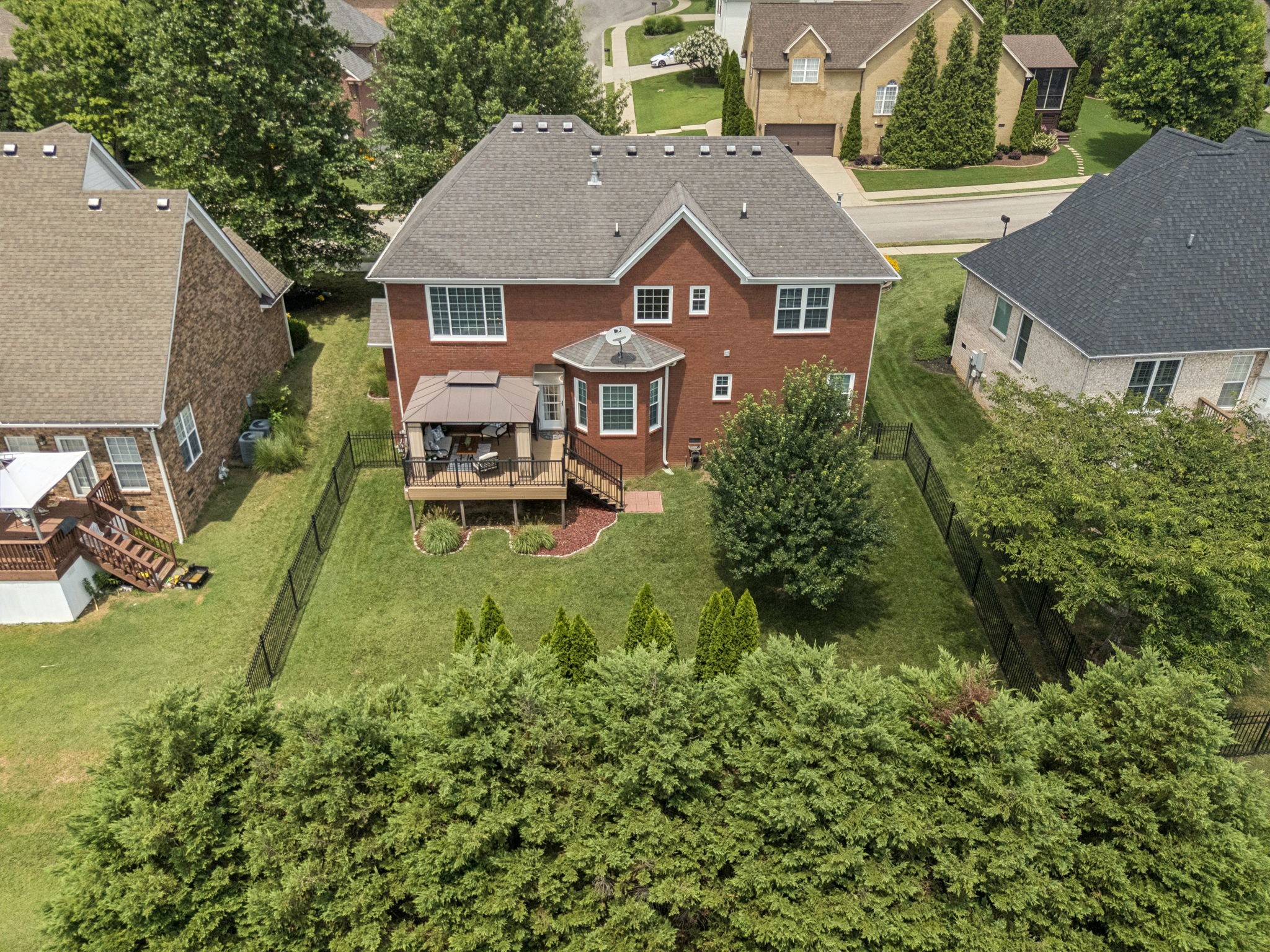 1011 Red Pepper Ridge Spring Hill, TN 37174 - Photo 73 of 76 an aerial view of a house with a yard