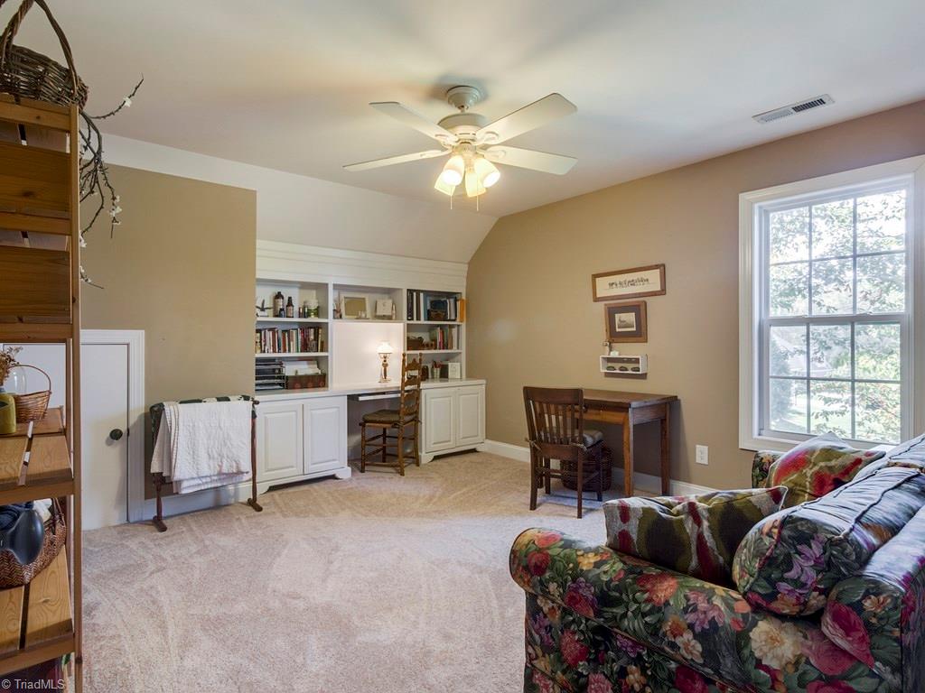 7070 Lanier Road Summerfield, NC 27358 - Photo 19 of 27 Second level Office has easily served as a 4th Bedroom with seasonal lake views