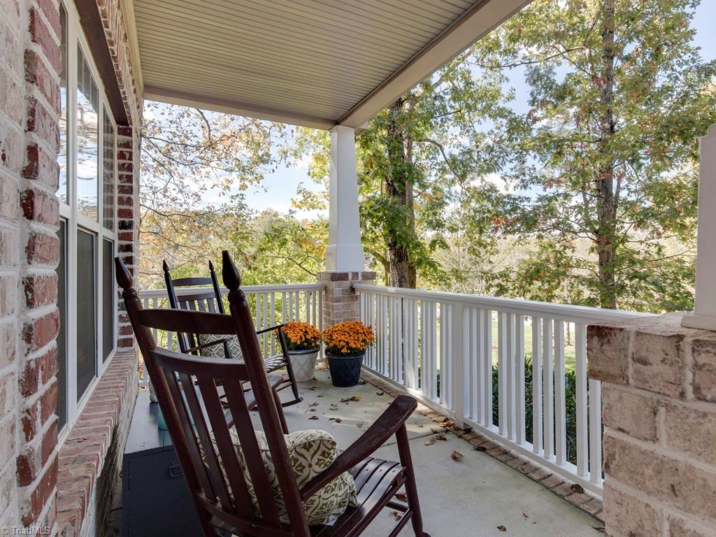 7070 Lanier Road Summerfield, NC 27358 - Photo 5 of 27 Front Porch with lake view