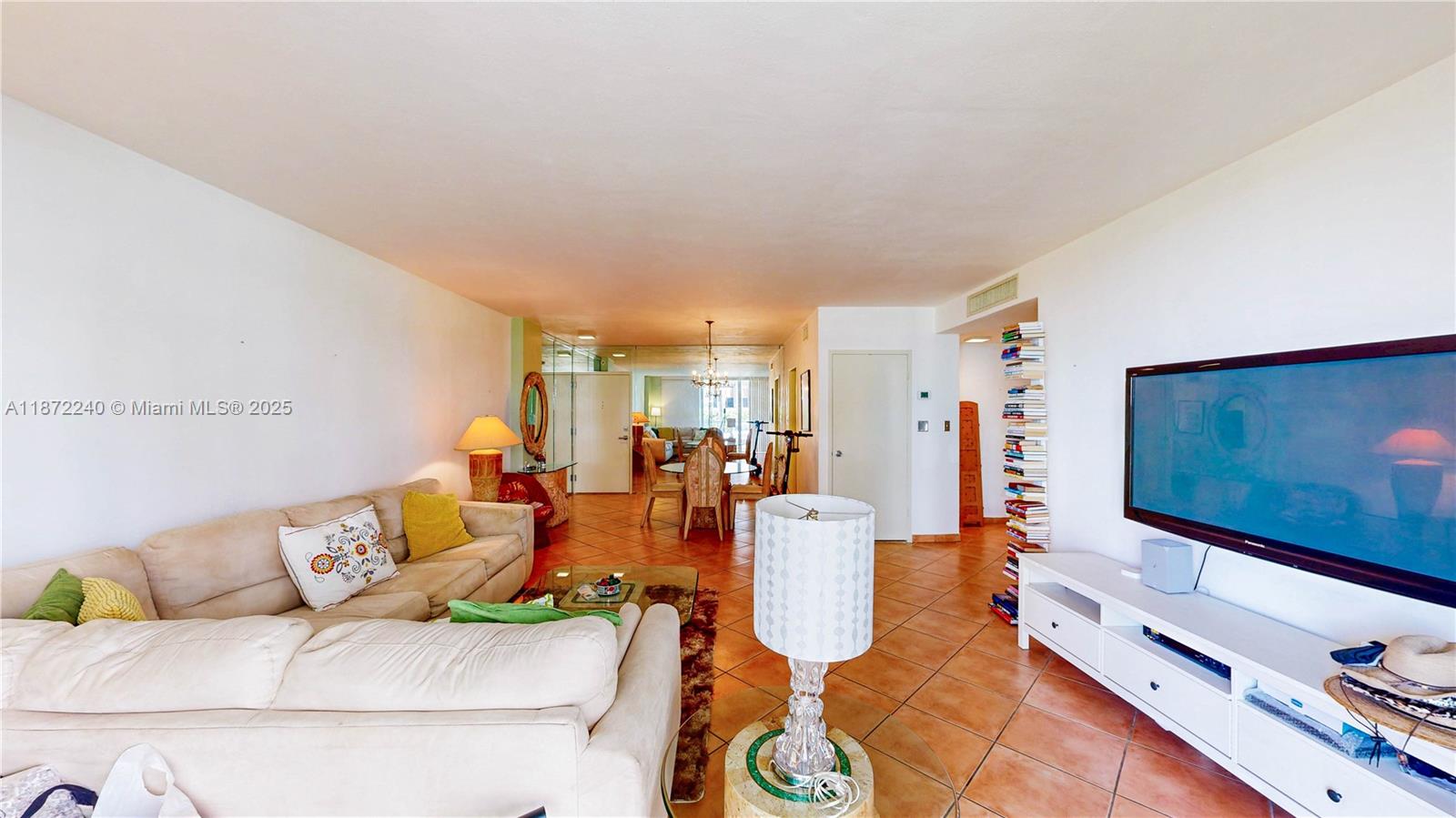 3301 Northeast 5th Avenue, Unit 110 Miami, FL 33137 - Photo 19 of 87 a living room with furniture and a flat screen tv