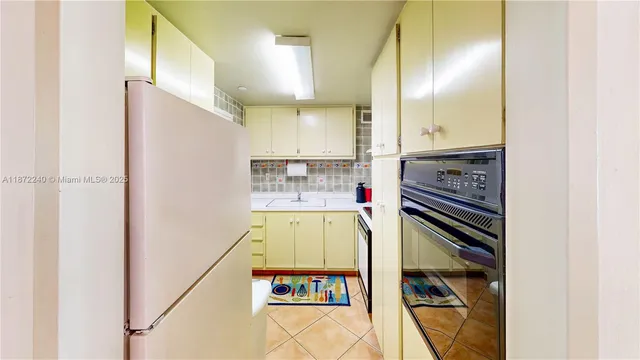 a bathroom with a toilet a sink and a shower