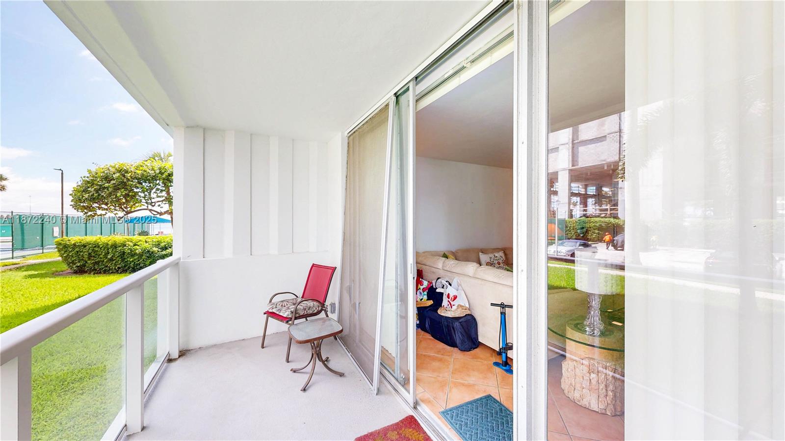 3301 Northeast 5th Avenue, Unit 110 Miami, FL 33137 - Photo 36 of 87 a very nice looking room with a large window and white walls