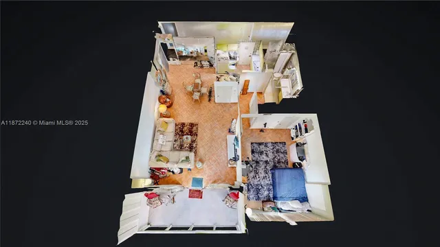 a hallway with a stove a microwave oven a dining table and chairs