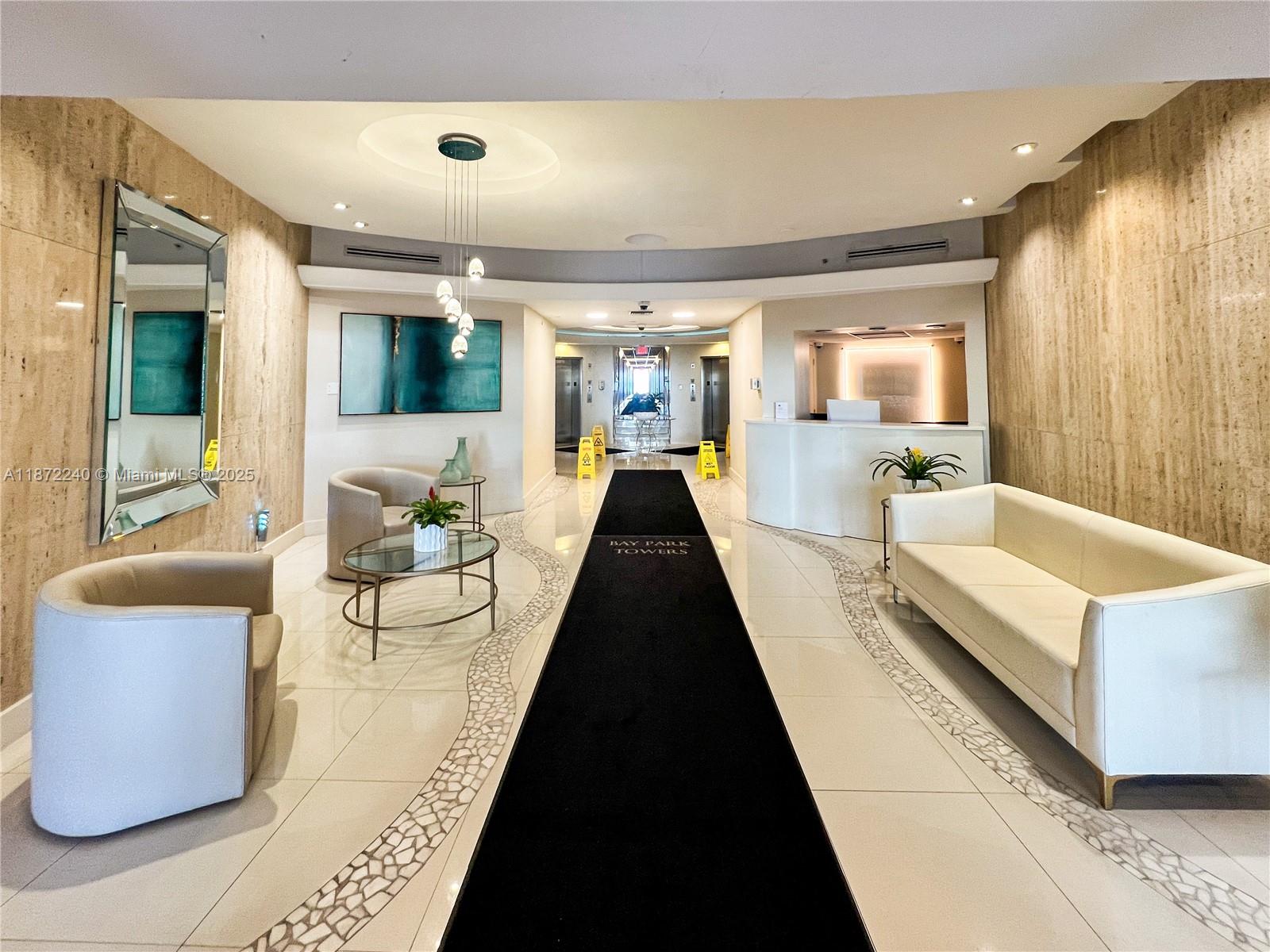 3301 Northeast 5th Avenue, Unit 110 Miami, FL 33137 - Photo 43 of 87 a living room with furniture and a large window