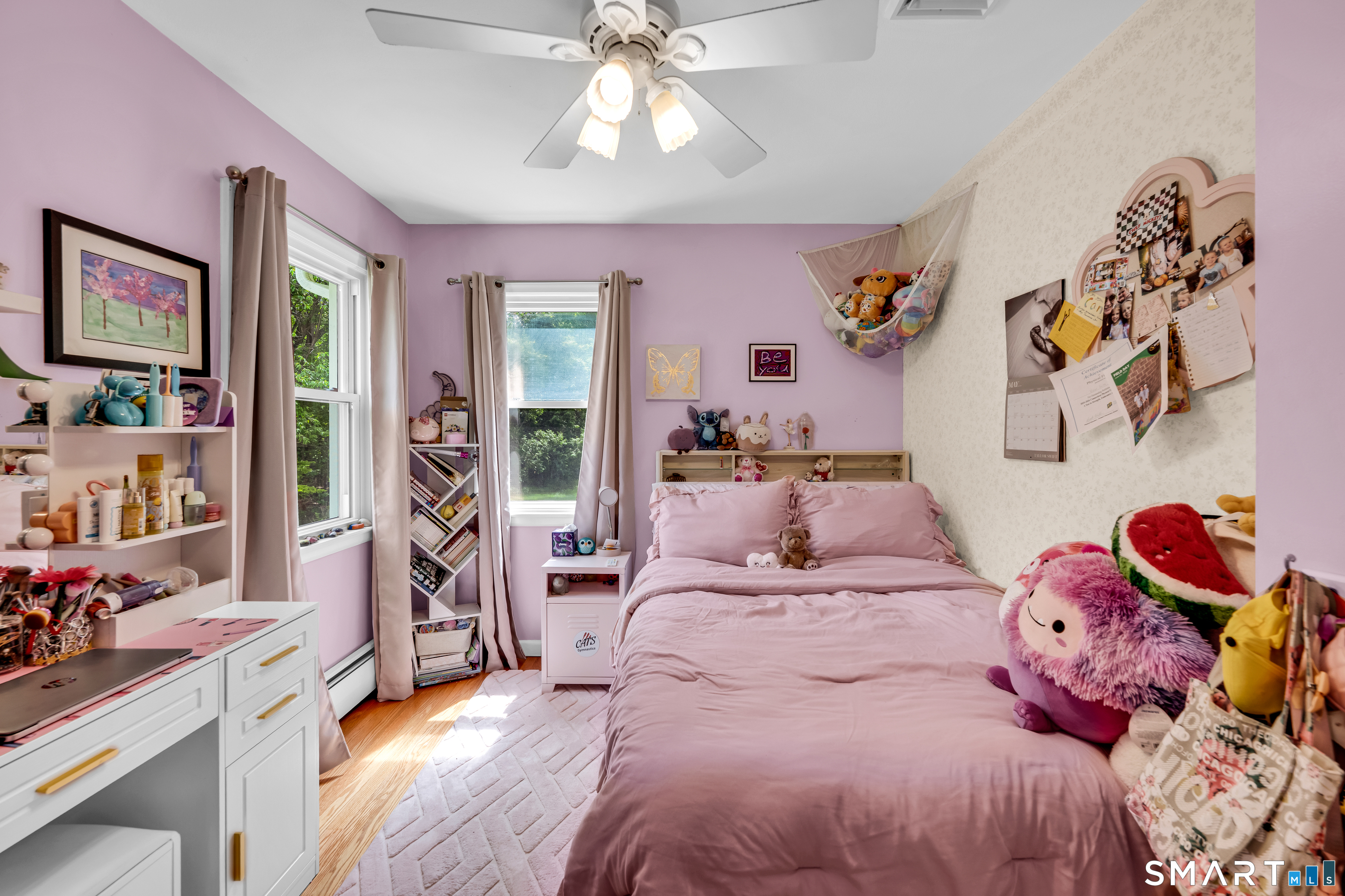 2 Hemlock Road Prospect, CT 06712 - Photo 15 of 27 a bedroom with a bed and a chandelier