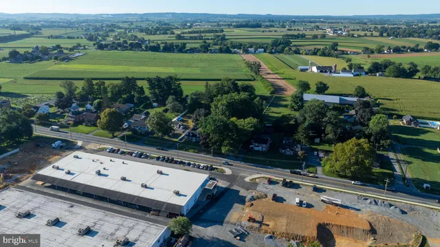 a view of a chairs and table in a patio