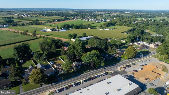 an aerial view of a golf course with outdoor space