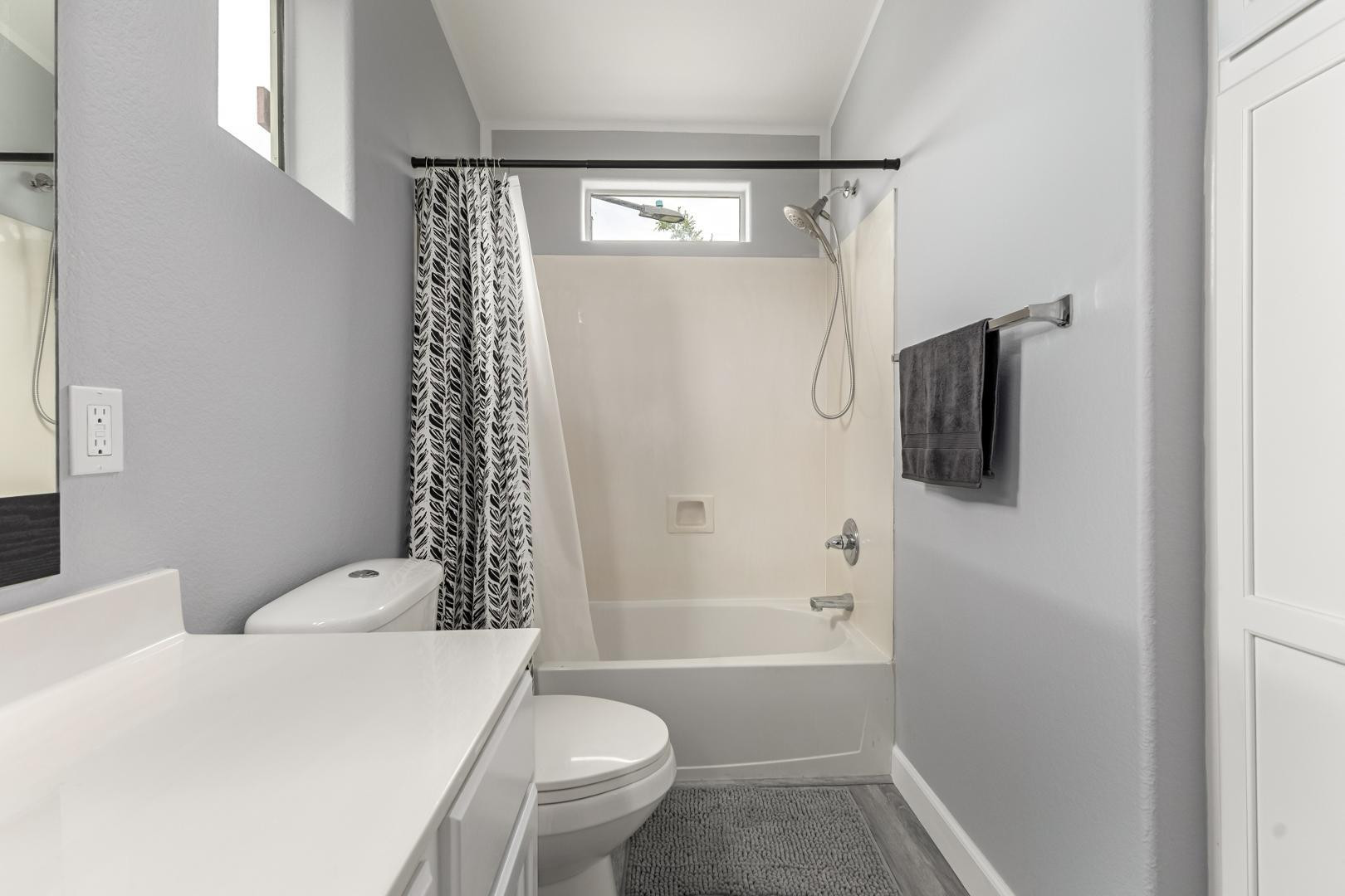 1350 South Greenfield Road, Unit 2205 Mesa, AZ 85206 - Photo 22 of 42 a bathroom with a shower a toilet and a sink