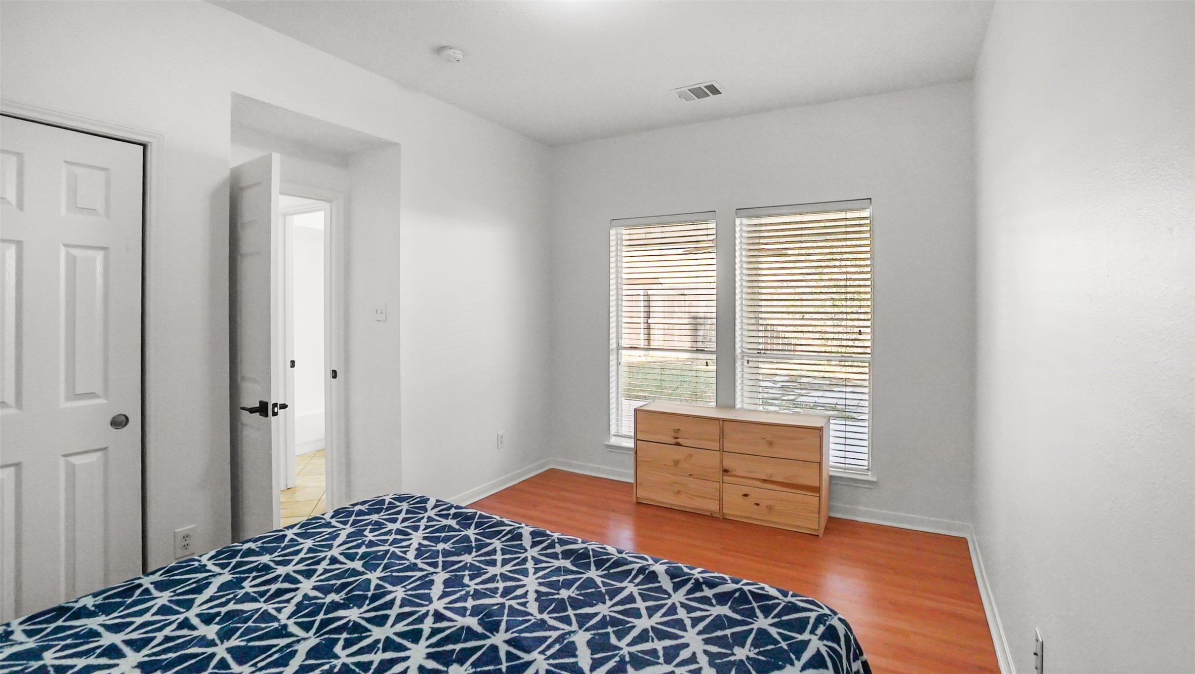 810 Flanners Court Spring, TX 77373 - Photo 17 of 42 a bedroom with a bed and a window