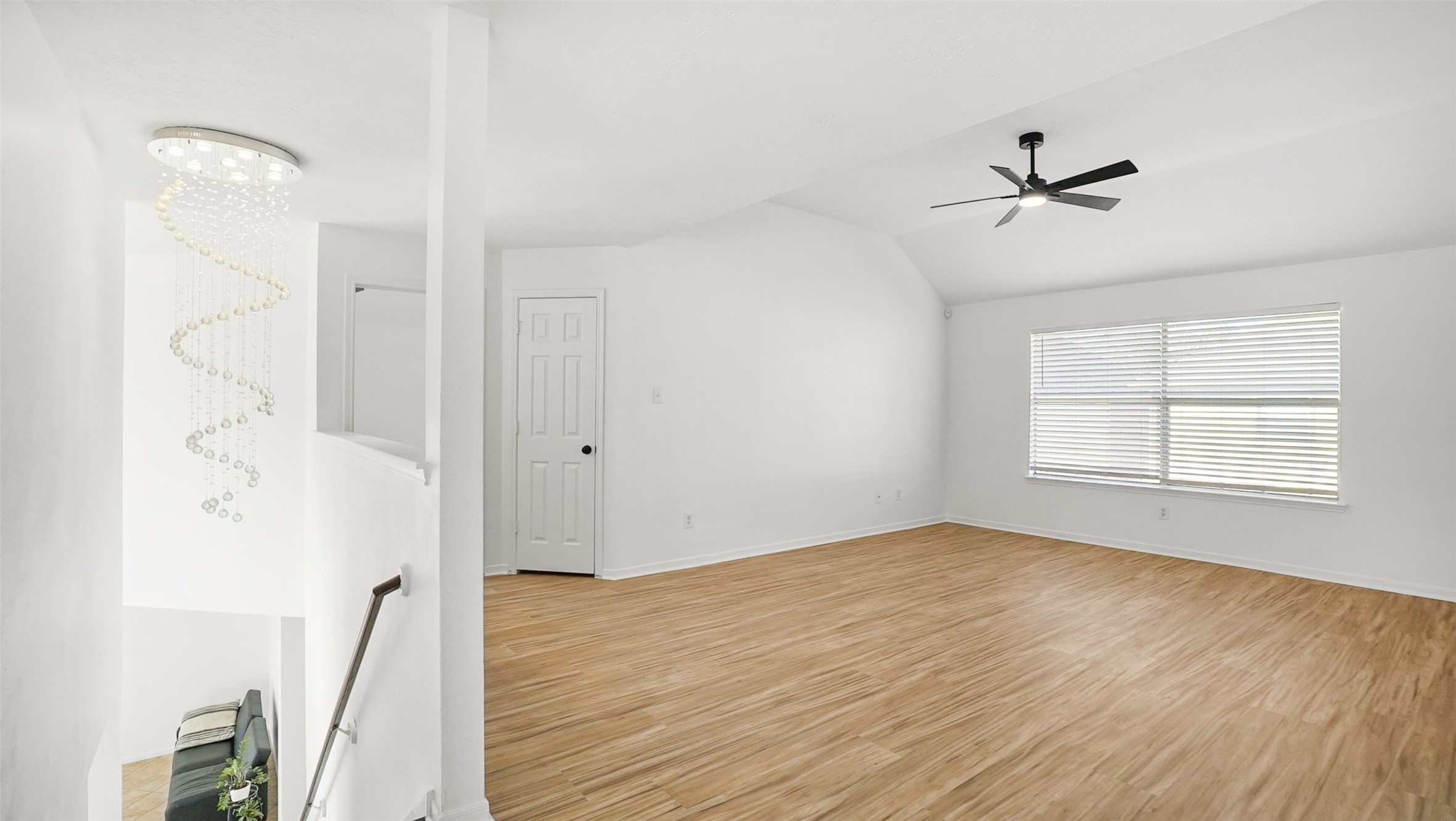 810 Flanners Court Spring, TX 77373 - Photo 19 of 42 a view of empty room with wooden floor and fan