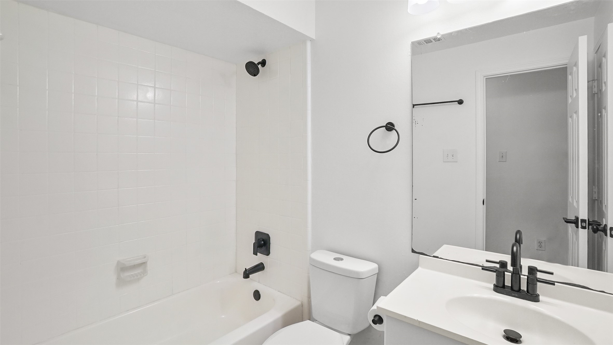 810 Flanners Court Spring, TX 77373 - Photo 20 of 45 a bathroom with a toilet sink and mirror