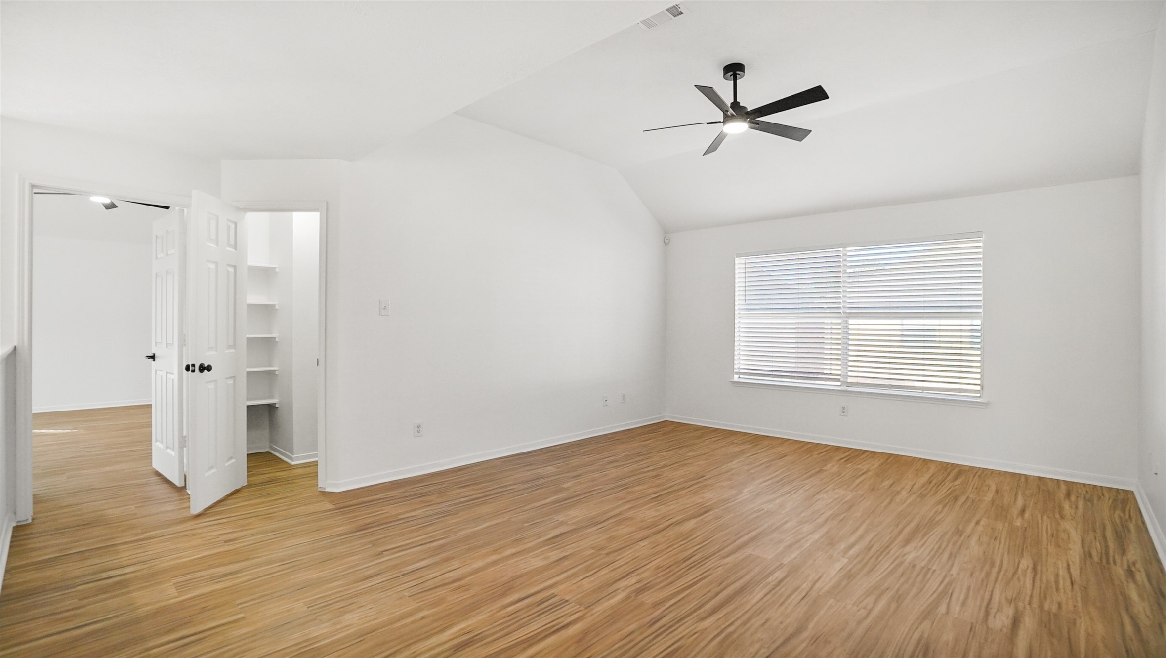 810 Flanners Court Spring, TX 77373 - Photo 20 of 42 wooden floor in an empty room with a window
