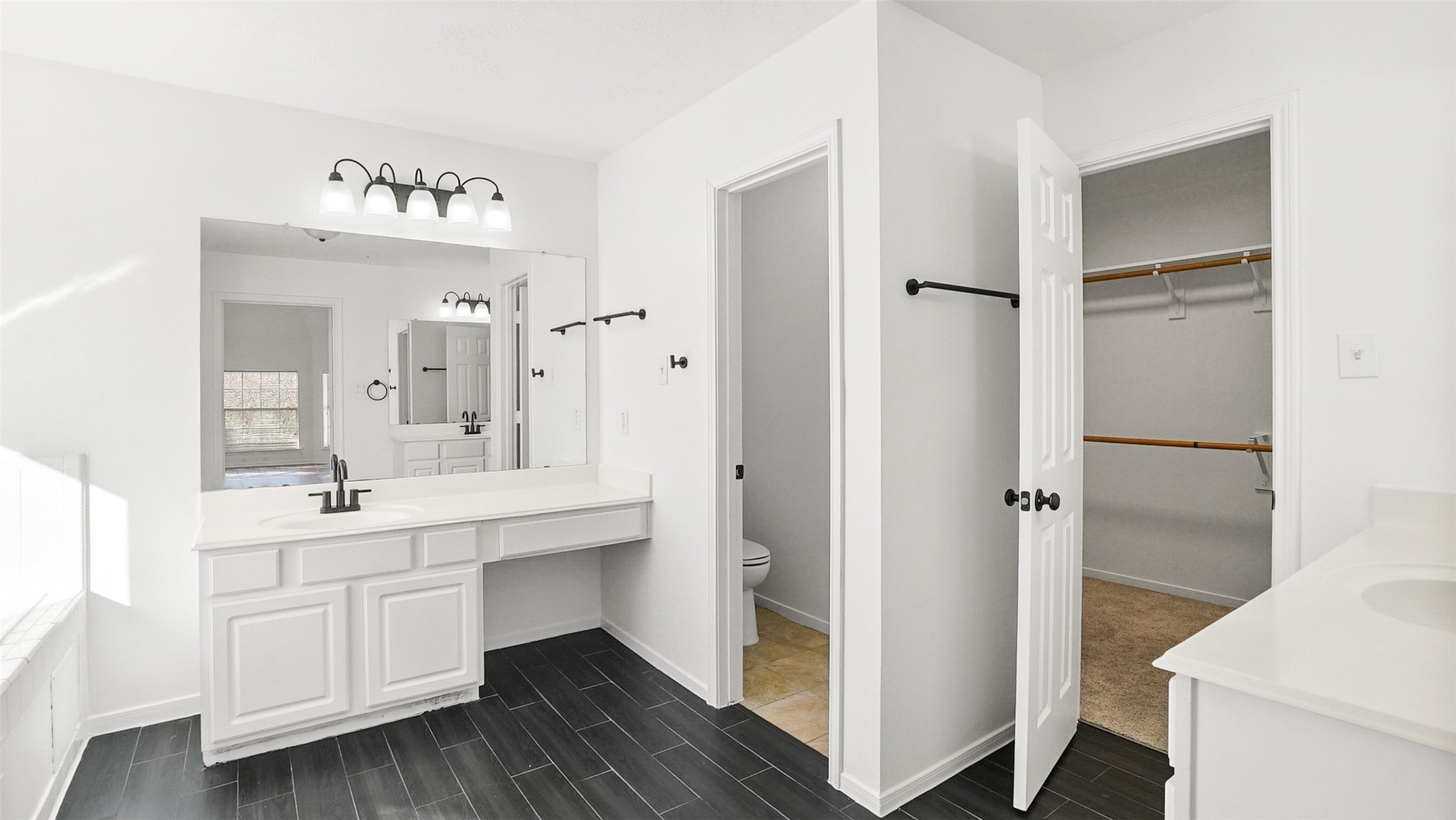 810 Flanners Court Spring, TX 77373 - Photo 28 of 45 a bathroom with a double vanity sink mirror and toilet