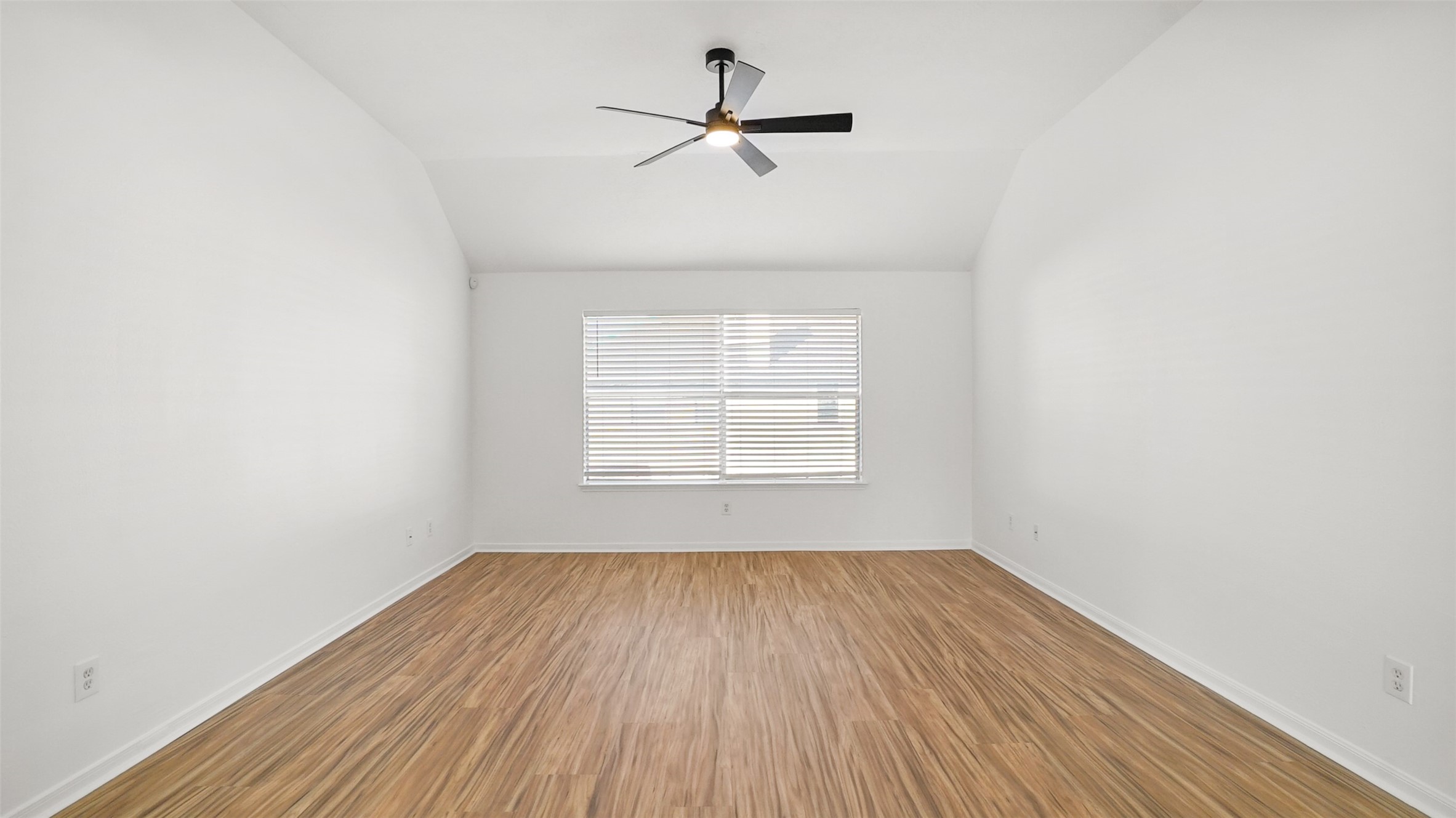 810 Flanners Court Spring, TX 77373 - Photo 29 of 42 an empty room with a window and a ceiling fan
