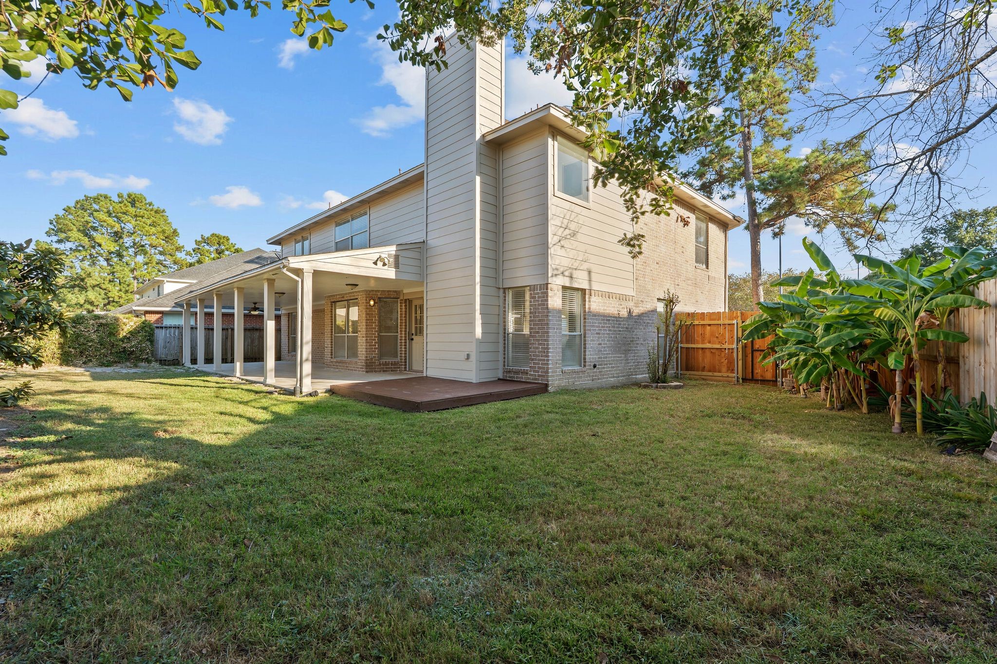 810 Flanners Court Spring, TX 77373 - Photo 39 of 45 a view of a house with a yard and plants
