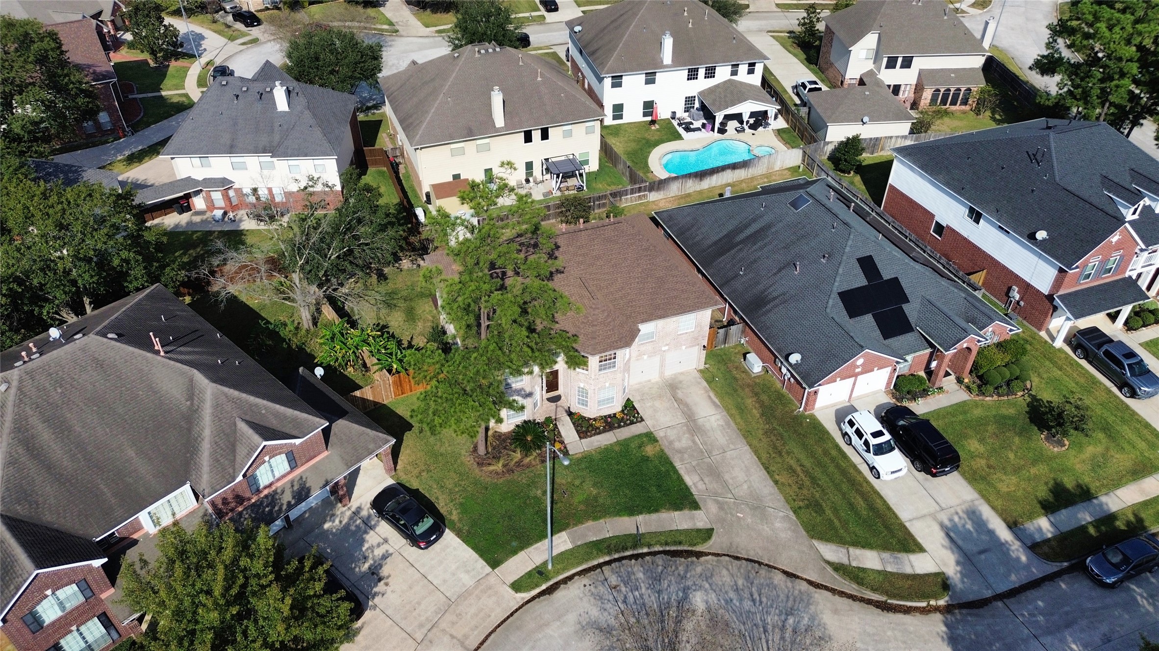 810 Flanners Court Spring, TX 77373 - Photo 43 of 45 an aerial view of multiple houses with yard