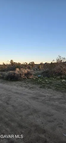 a view of an ocean and mountain