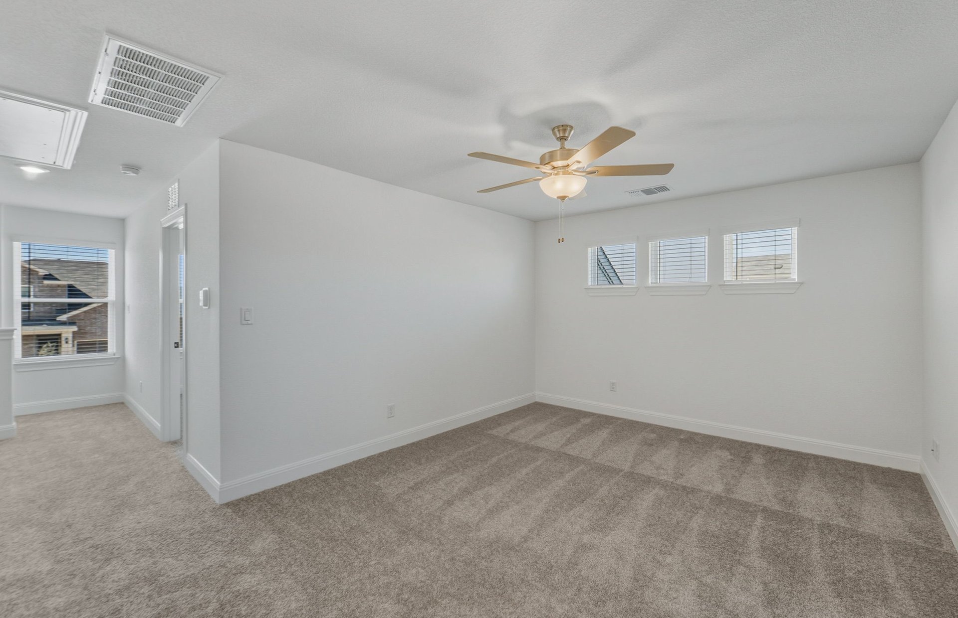 16800 Catemaco Walk Manor Manor, TX 78653 - Photo 13 of 26 wooden floor in an empty room with a window