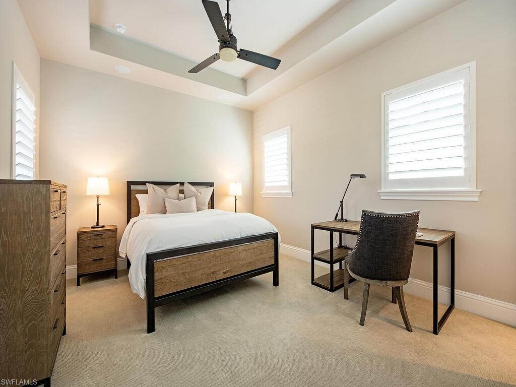 9200 Mercato Way Naples, FL 34108 - Photo 7 of 13 a bedroom with a bed chair and window