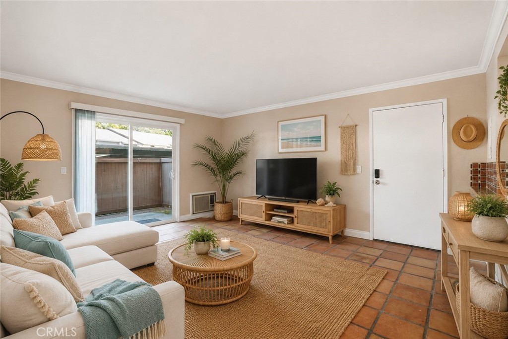 20702 El Toro Road, Unit 231 Lake Forest, CA 92630 - Photo 1 of 36 a living room with furniture and a flat screen tv