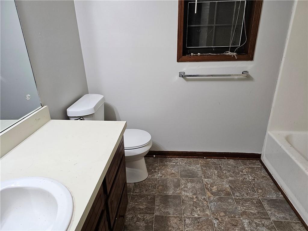 2835 Springdale Road, Unit B Snellville, GA 30039 - Photo 10 of 21 a bathroom with a toilet and a sink