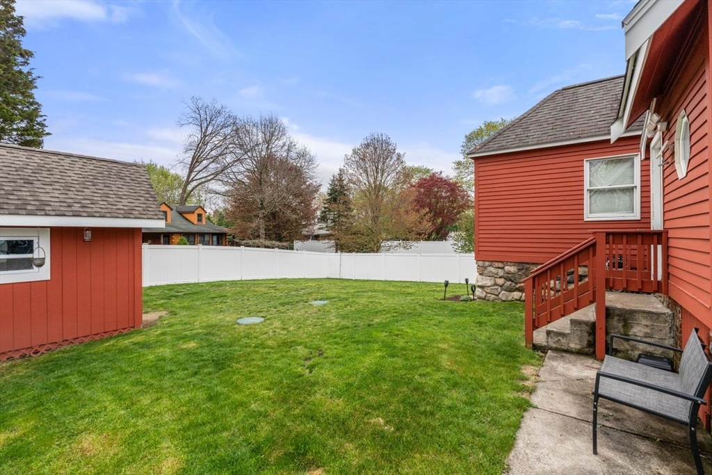 66 Bethany Road Framingham, MA 01702 - Photo 14 of 20 a backyard of a house with lots of green space