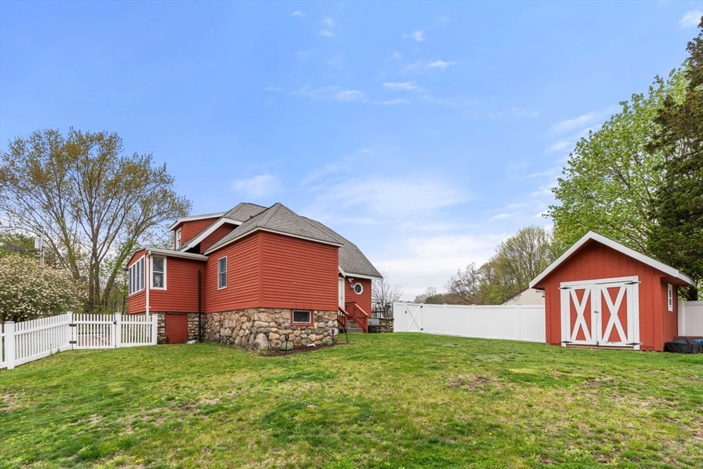 66 Bethany Road Framingham, MA 01702 - Photo 16 of 20 a view of a house with a yard