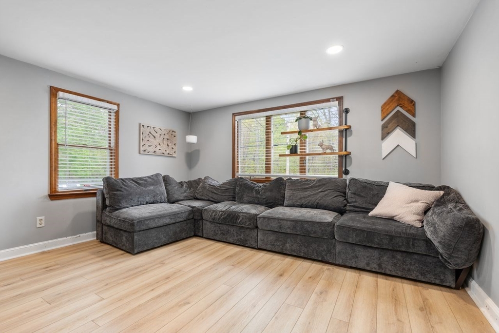 66 Bethany Road Framingham, MA 01702 - Photo 6 of 20 a living room with furniture and a large window