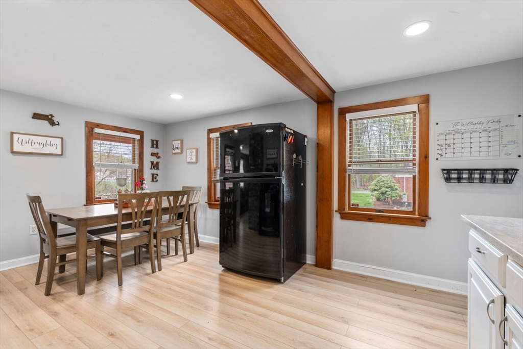 66 Bethany Road Framingham, MA 01702 - Photo 8 of 20 a view of a dining room with furniture and window