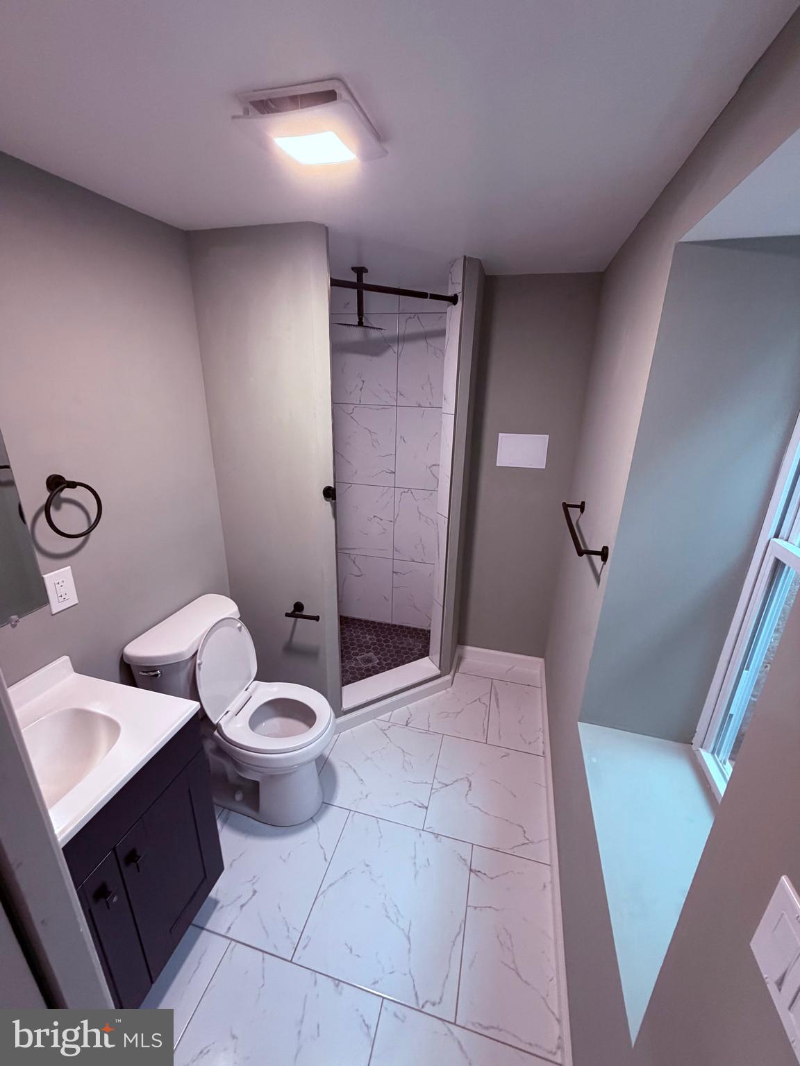 3507 Riviera Street Temple Hills, MD 20748 - Photo 15 of 16 a bathroom with a sink and a toilet