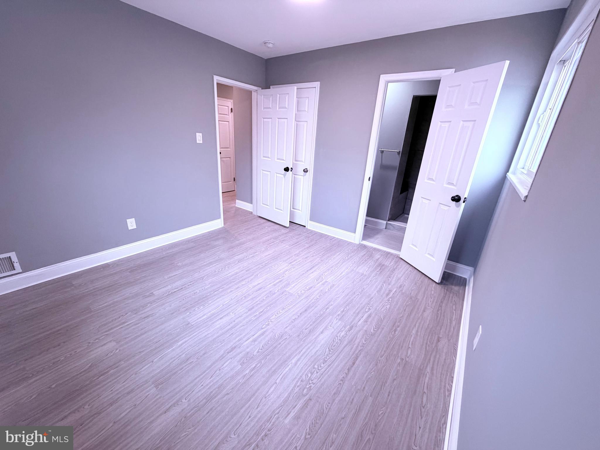 3507 Riviera Street Temple Hills, MD 20748 - Photo 4 of 16 wooden floor in an empty room