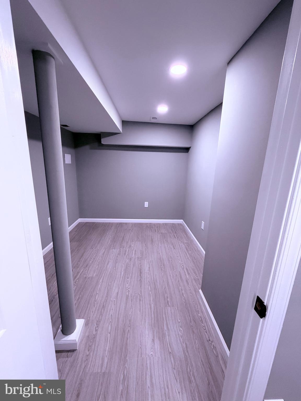 3507 Riviera Street Temple Hills, MD 20748 - Photo 9 of 16 a view of a hallway with wooden floor