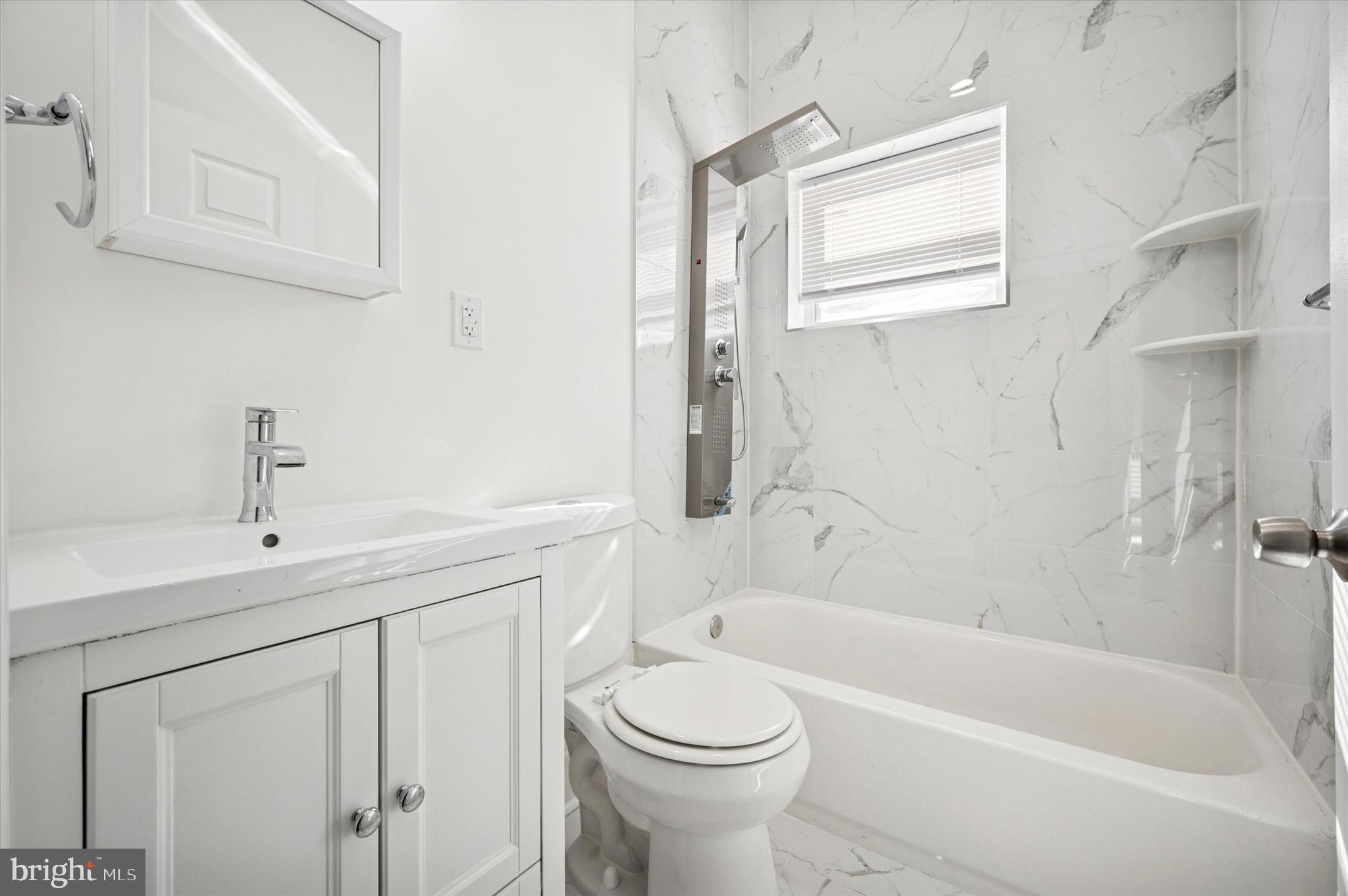 2135 North 20th Street Philadelphia, PA 19121 - Photo 11 of 20 a bathroom with a sink a toilet and shower