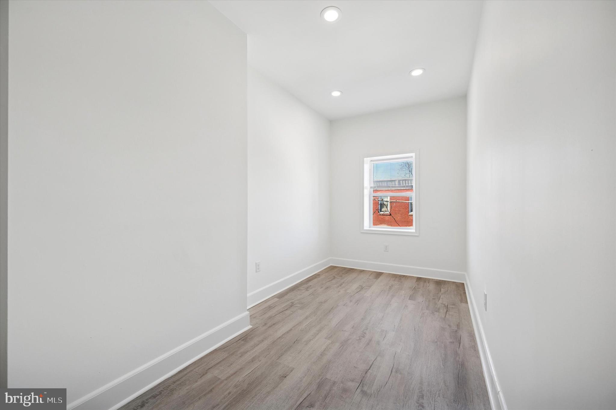 2135 North 20th Street Philadelphia, PA 19121 - Photo 19 of 20 a view of room with wooden floor and window