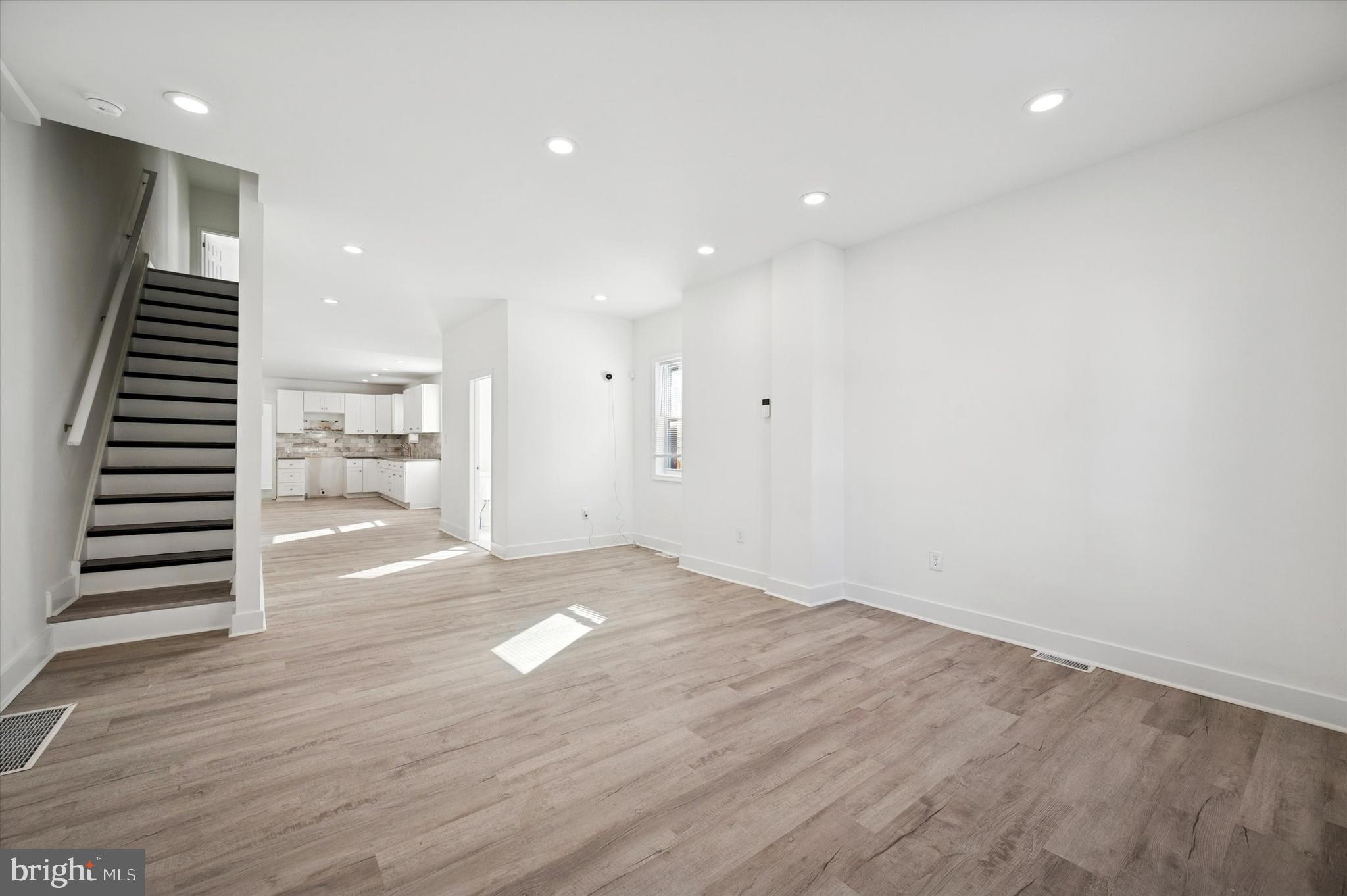 2135 North 20th Street Philadelphia, PA 19121 - Photo 2 of 20 an empty room with wooden floor