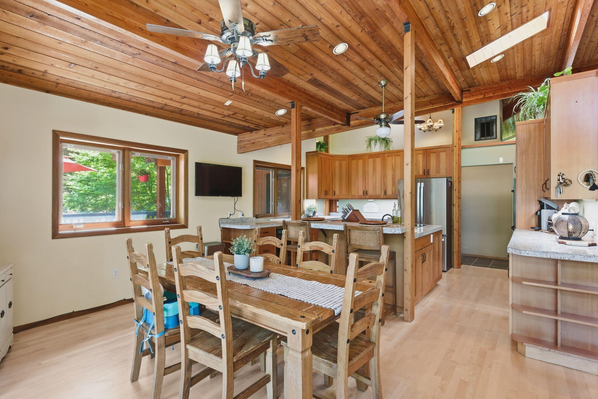 856 Greentree Loop Grants Pass, OR 97527 - Photo 22 of 62 a view of a dining room with furniture window and outside view