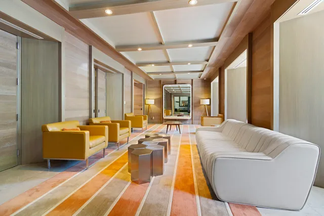 a living room with a couch and a flat screen tv