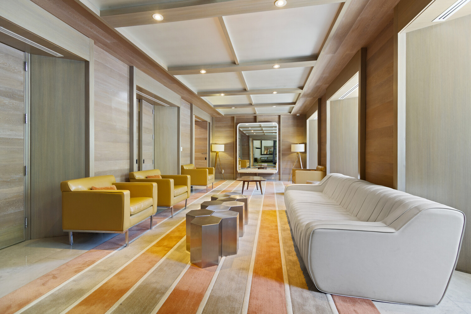 225 Rector Place, Unit 9B Manhattan, NY 10280 - Photo 12 of 14 a living room with fireplace furniture and a large window