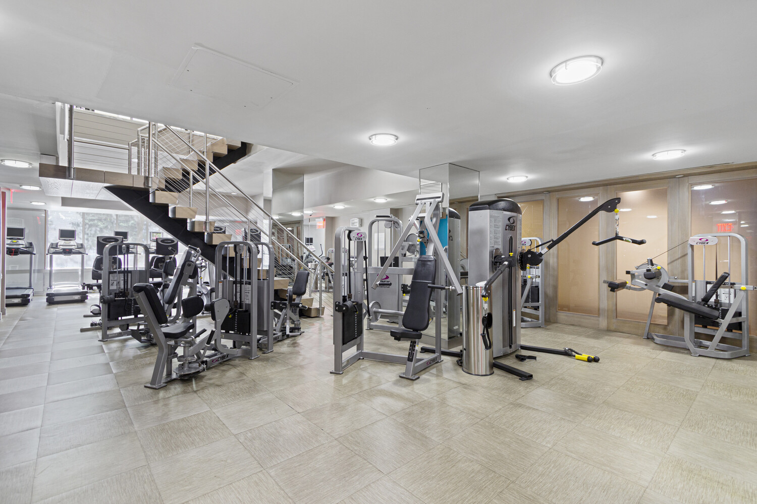 225 Rector Place, Unit 9B Manhattan, NY 10280 - Photo 8 of 14 a view of a room with gym equipment